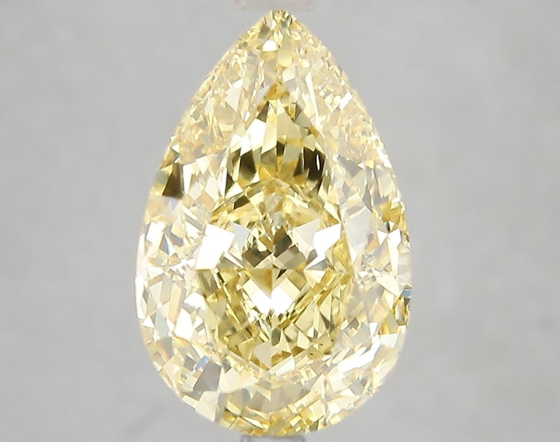 Loose Diamond - PEAR 5.02ct Fancy Vivid Yellow VS1: Loose Diamond - PEAR 5.02ct Fancy Vivid Yellow VS1 Source: This is a real non-mined Diamond that has been grown in a lab Shape: PEAR Carats: 5.02 Color: Fancy Vivid Yellow Certification: IGI Video: