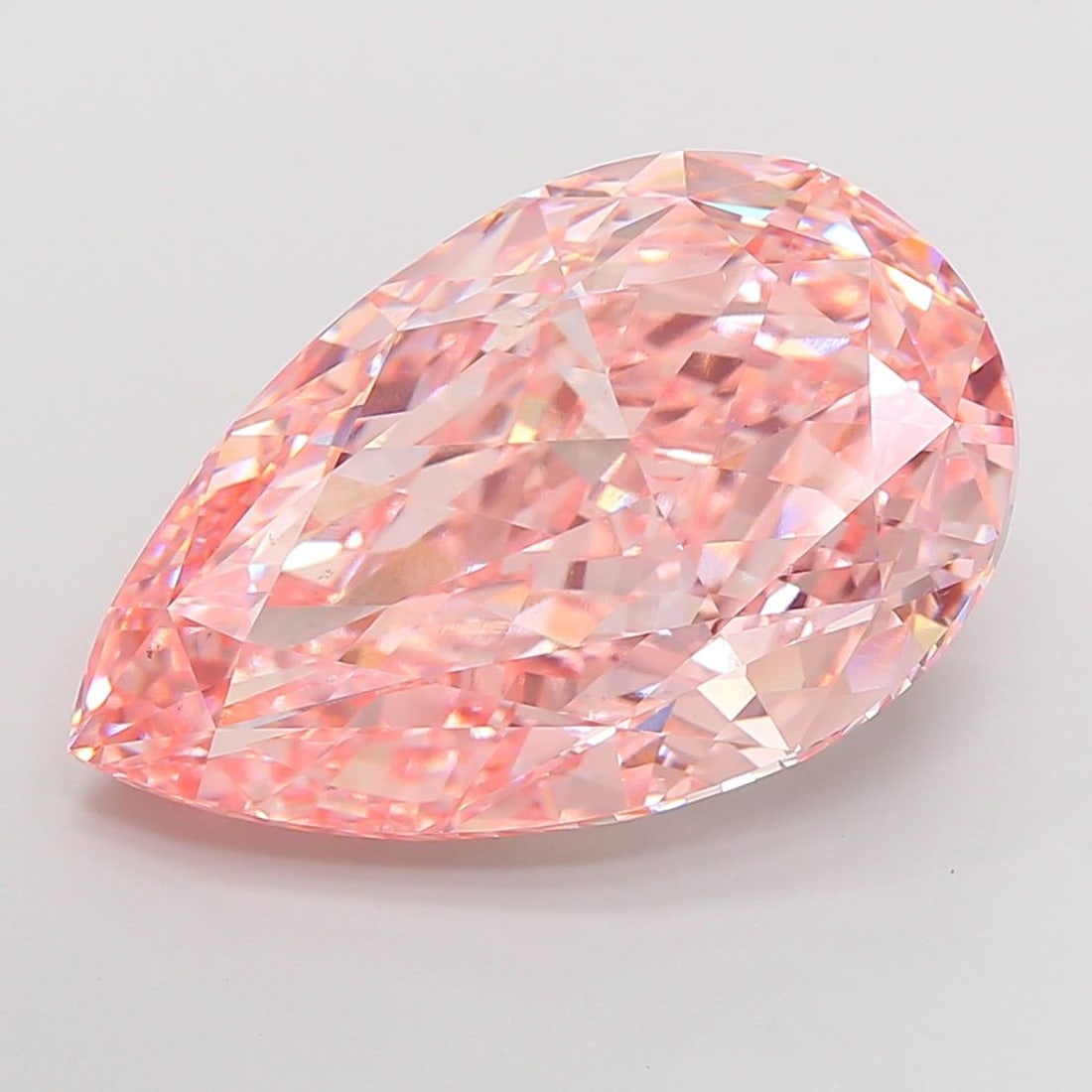 Loose Diamond - PEAR 30.43ct Fancy Vivid Pink VS1: Loose Diamond - PEAR 30.43ct Fancy Vivid Pink VS1 Source: This is a real non-mined Diamond that has been grown in a lab Shape: PEAR Carats: 30.43 Color: Fancy Vivid Pink Certification: IGI Video: