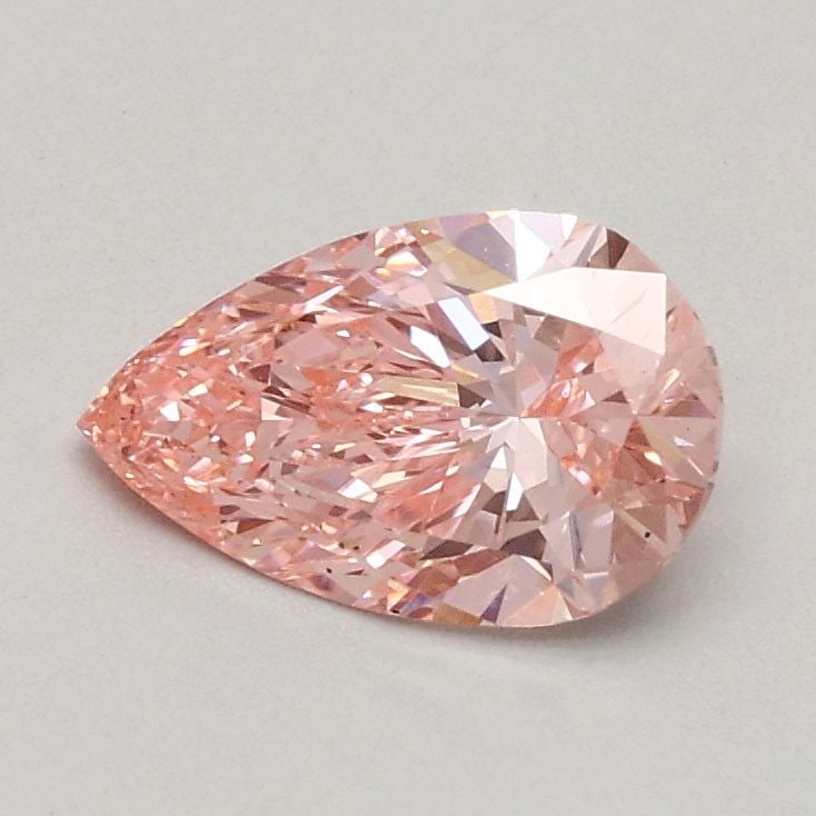 Loose Diamond - PEAR 0.54ct Fancy Vivid Pink VVS2: Loose Diamond - PEAR 0.54ct Fancy Vivid Pink VVS2 Source: This is a real non-mined Diamond that has been grown in a lab Shape: PEAR Carats: 0.54 Color: Fancy Vivid Pink Certification: IGI Video: