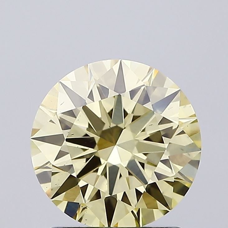 Ideal Loose Diamond - ROUND 1.56ct Fancy Yellow VS2: Ideal Loose Diamond - ROUND 1.56ct Fancy Yellow VS2 Source: This is a real non-mined Diamond that has been grown in a lab Shape: ROUND Carats: 1.56 Color: Fancy Yellow Certification: IGI Video: