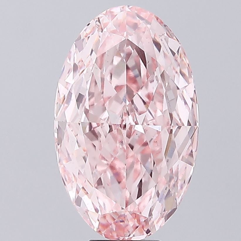 Loose Diamond - OVAL 9.5ct Fancy Vivid Pink VS1: Loose Diamond - OVAL 9.5ct Fancy Vivid Pink VS1 Source: This is a real non-mined Diamond that has been grown in a lab Shape: OVAL Carats: 9.5 Color: Fancy Vivid Pink Certification: IGI Video:
