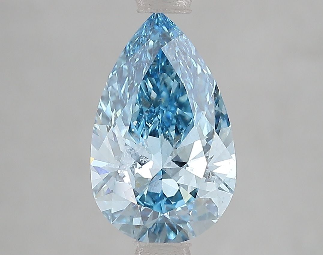 Loose Diamond - PEAR 1.87ct Fancy Vivid Blue VS1: Loose Diamond - PEAR 1.87ct Fancy Vivid Blue VS1 Source: This is a real non-mined Diamond that has been grown in a lab Shape: PEAR Carats: 1.87 Color: Fancy Vivid Blue Certification: IGI The Diamond D