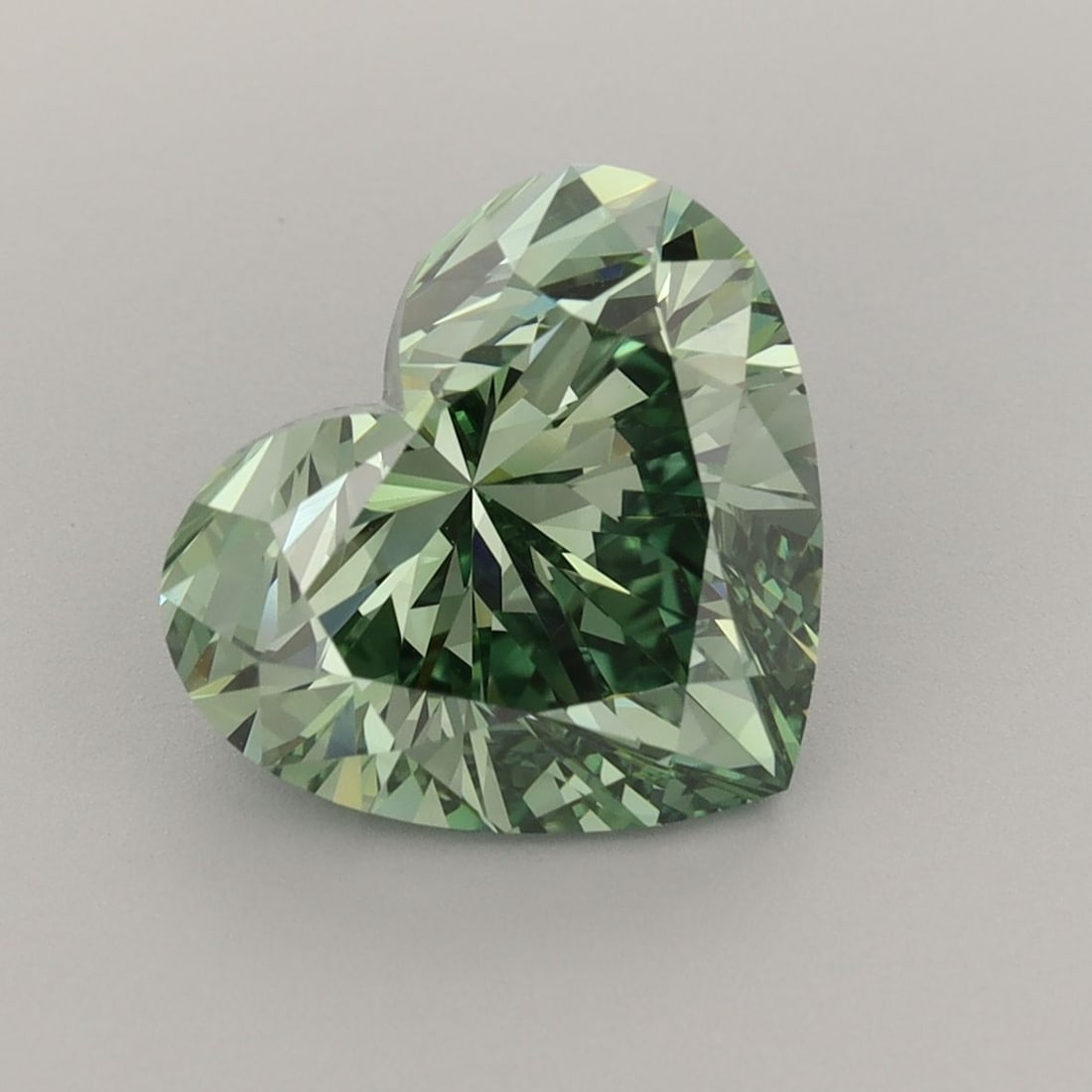 Loose Diamond - HEART 3.58ct Fancy Vivid Green VVS2: Loose Diamond - HEART 3.58ct Fancy Vivid Green VVS2 Source: This is a real non-mined Diamond that has been grown in a lab Shape: HEART Carats: 3.58 Color: Fancy Vivid Green Certification: IGI The Diam
