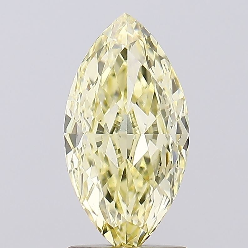 Loose Diamond - MARQUISE 2.05ct Fancy Yellow VS1: Loose Diamond - MARQUISE 2.05ct Fancy Yellow VS1 Source: This is a real non-mined Diamond that has been grown in a lab Shape: MARQUISE Carats: 2.05 Color: Fancy Yellow Certification: IGI Video: