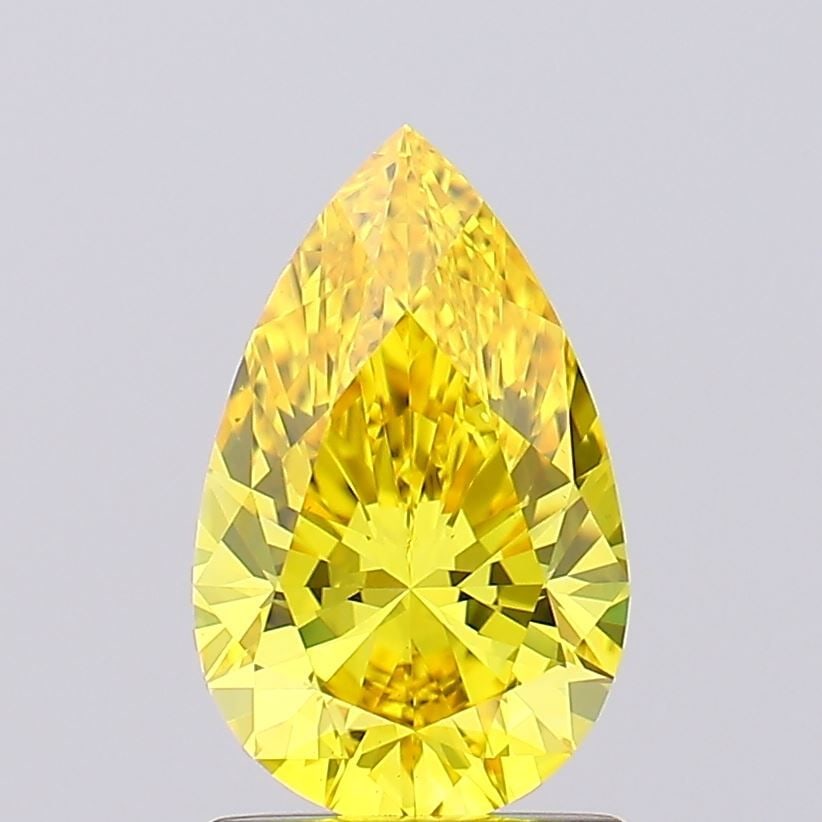 Loose Diamond - PEAR 1.32ct Fancy Vivid Yellow VS1: Loose Diamond - PEAR 1.32ct Fancy Vivid Yellow VS1 Source: This is a real non-mined Diamond that has been grown in a lab Shape: PEAR Carats: 1.32 Color: Fancy Vivid Yellow Certification: IGI Video: