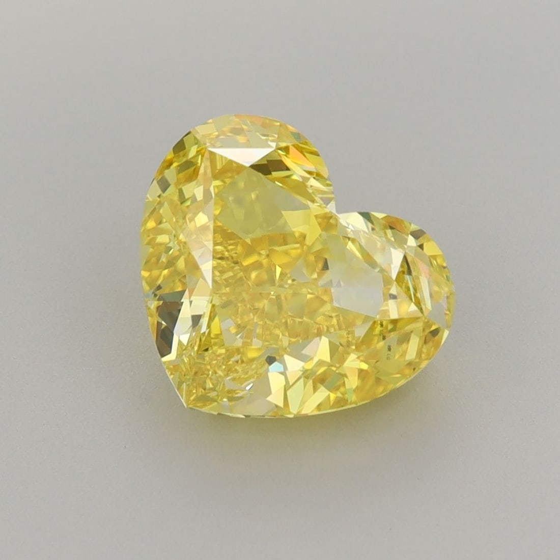 Loose Diamond - HEART 2.63ct Fancy Vivid Yellow VVS2: Loose Diamond - HEART 2.63ct Fancy Vivid Yellow VVS2 Source: This is a real non-mined Diamond that has been grown in a lab Shape: HEART Carats: 2.63 Color: Fancy Vivid Yellow Certification: IGI The Di