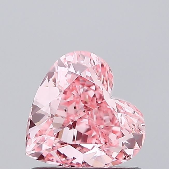 Loose Diamond - HEART 1.01ct Fancy Vivid Pink SI1: Loose Diamond - HEART 1.01ct Fancy Vivid Pink SI1 Source: This is a real non-mined Diamond that has been grown in a lab Shape: HEART Carats: 1.01 Color: Fancy Vivid Pink Certification: IGI Video: