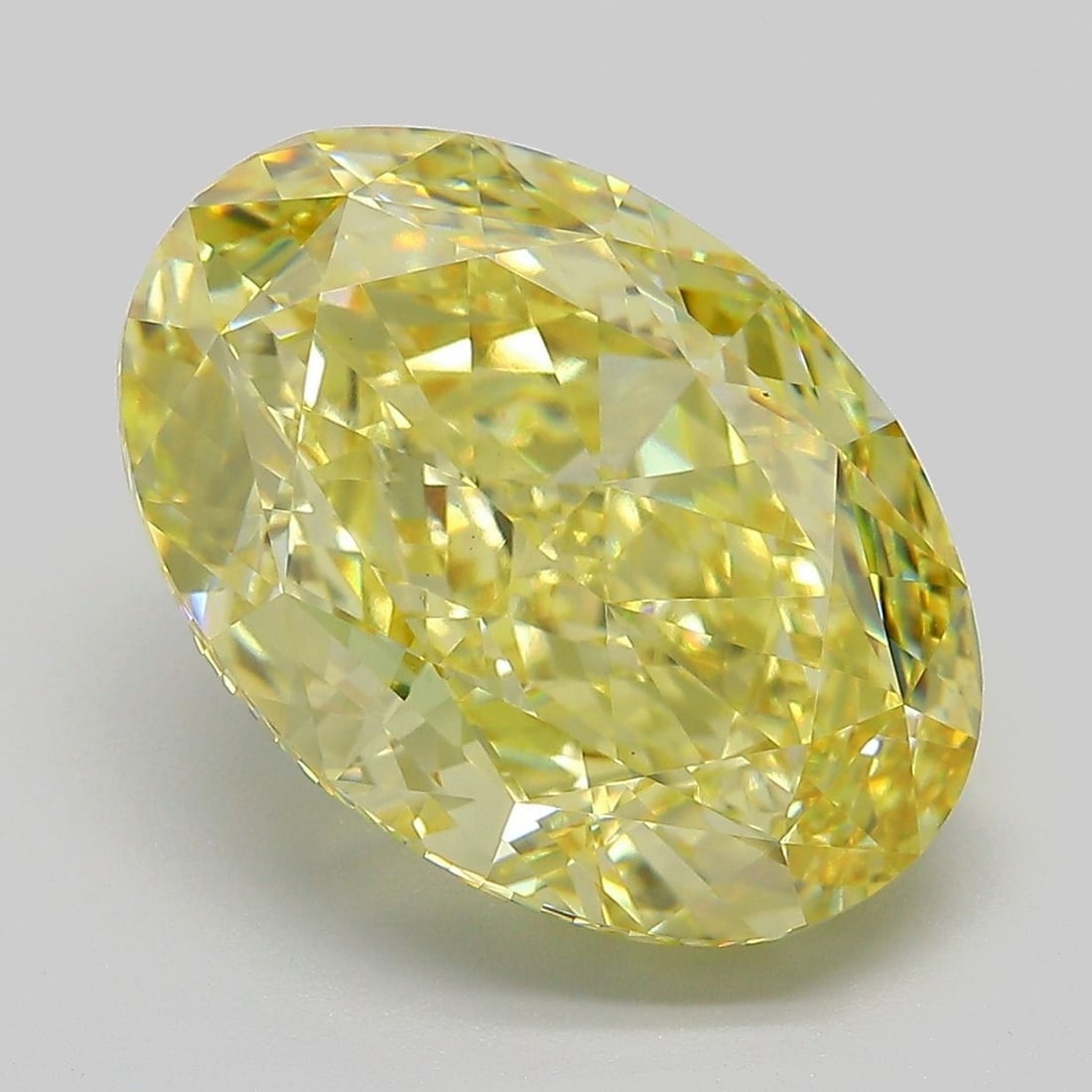 Loose Diamond - OVAL 9.66ct Fancy Intense Yellow VVS2: Loose Diamond - OVAL 9.66ct Fancy Intense Yellow VVS2 Source: This is a real non-mined Diamond that has been grown in a lab Shape: OVAL Carats: 9.66 Color: Fancy Intense Yellow Certification: IGI Vide