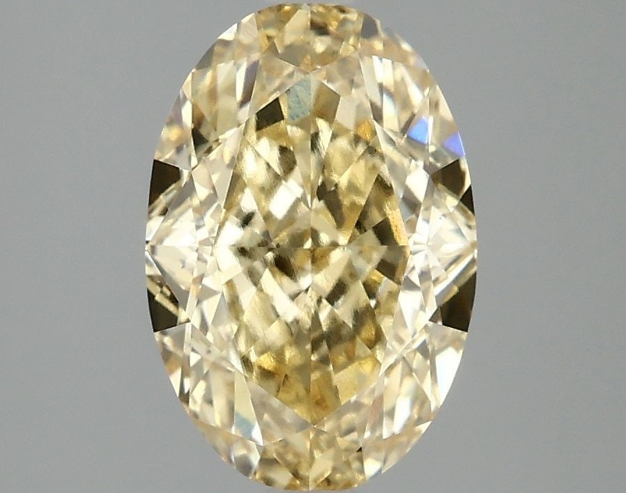 Loose Diamond - OVAL 2.91ct Fancy Intense Yellow VS1: Loose Diamond - OVAL 2.91ct Fancy Intense Yellow VS1 Source: This is a real non-mined Diamond that has been grown in a lab Shape: OVAL Carats: 2.91 Color: Fancy Intense Yellow Certification: IGI Video