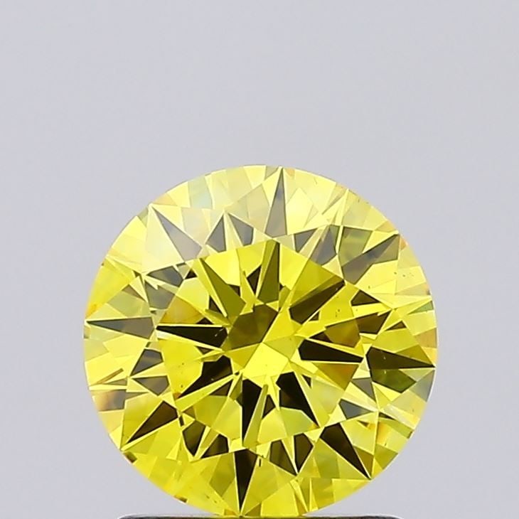Loose Diamond - ROUND 1.4ct Fancy Vivid Yellow VS2: Loose Diamond - ROUND 1.4ct Fancy Vivid Yellow VS2 Source: This is a real non-mined Diamond that has been grown in a lab Shape: ROUND Carats: 1.4 Color: Fancy Vivid Yellow Certification: IGI Video: