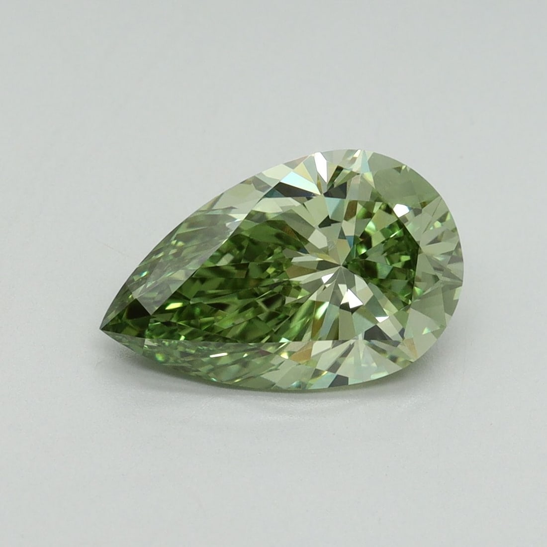 Loose Diamond - PEAR 2.18ct Fancy Vivid Green VVS2: Loose Diamond - PEAR 2.18ct Fancy Vivid Green VVS2 Source: This is a real non-mined Diamond that has been grown in a lab Shape: PEAR Carats: 2.18 Color: Fancy Vivid Green Certification: IGI Video: