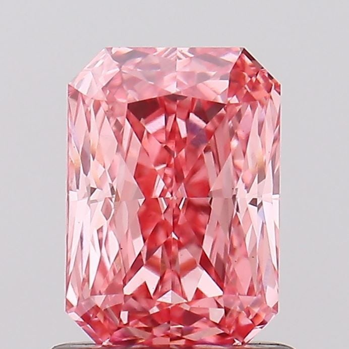 Loose Diamond - RADIANT 1.07ct Fancy Vivid Pink VS1: Loose Diamond - RADIANT 1.07ct Fancy Vivid Pink VS1 Source: This is a real non-mined Diamond that has been grown in a lab Shape: RADIANT Carats: 1.07 Color: Fancy Vivid Pink Certification: IGI Video: