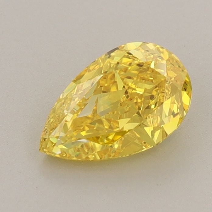 Loose Diamond - PEAR 0.93ct Fancy Vivid Yellow VVS2: Loose Diamond - PEAR 0.93ct Fancy Vivid Yellow VVS2 Source: This is a real non-mined Diamond that has been grown in a lab Shape: PEAR Carats: 0.93 Color: Fancy Vivid Yellow Certification: IGI Video: