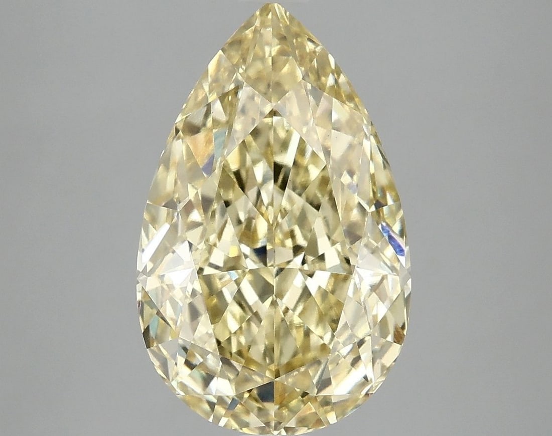 Loose Diamond - PEAR 4.1ct Fancy Vivid Yellow VS1: Loose Diamond - PEAR 4.1ct Fancy Vivid Yellow VS1 Source: This is a real non-mined Diamond that has been grown in a lab Shape: PEAR Carats: 4.1 Color: Fancy Vivid Yellow Certification: IGI Video: