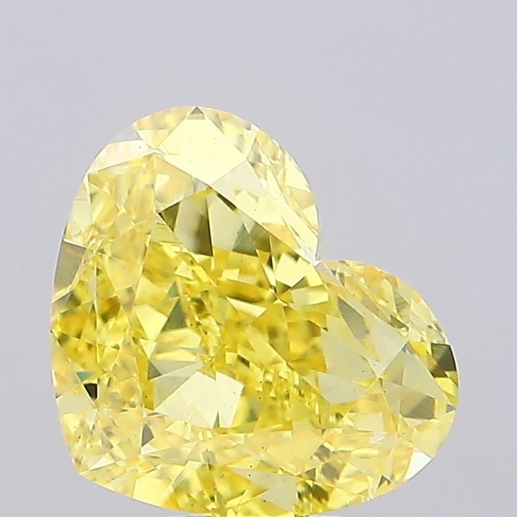 Loose Diamond - HEART 8.51ct Fancy Vivid Yellow VS1: Loose Diamond - HEART 8.51ct Fancy Vivid Yellow VS1 Source: This is a real non-mined Diamond that has been grown in a lab Shape: HEART Carats: 8.51 Color: Fancy Vivid Yellow Certification: IGI Video: