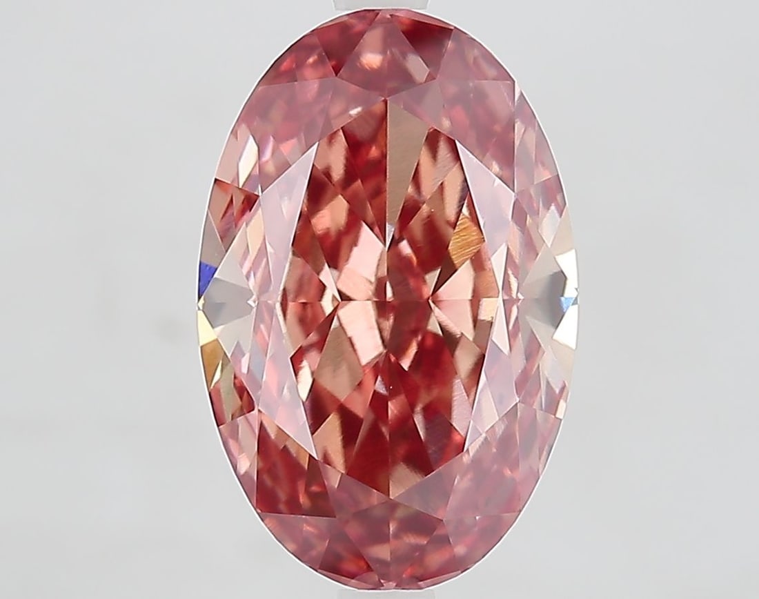 Loose Diamond - OVAL 5.15ct Fancy Vivid Brown Pink VVS2: Loose Diamond - OVAL 5.15ct Fancy Vivid Brown Pink VVS2 Source: This is a real non-mined Diamond that has been grown in a lab Shape: OVAL Carats: 5.15 Color: Fancy Vivid Brown Pink Certification: IGI