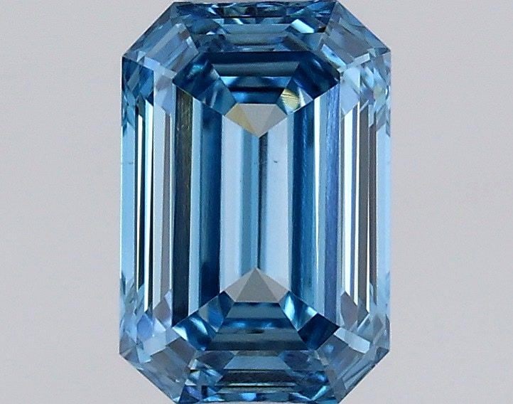 Loose Diamond - EMERALD 0.59ct Fancy Vivid Blue VS1: Loose Diamond - EMERALD 0.59ct Fancy Vivid Blue VS1 Source: This is a real non-mined Diamond that has been grown in a lab Shape: EMERALD Carats: 0.59 Color: Fancy Vivid Blue Certification: IGI Video: