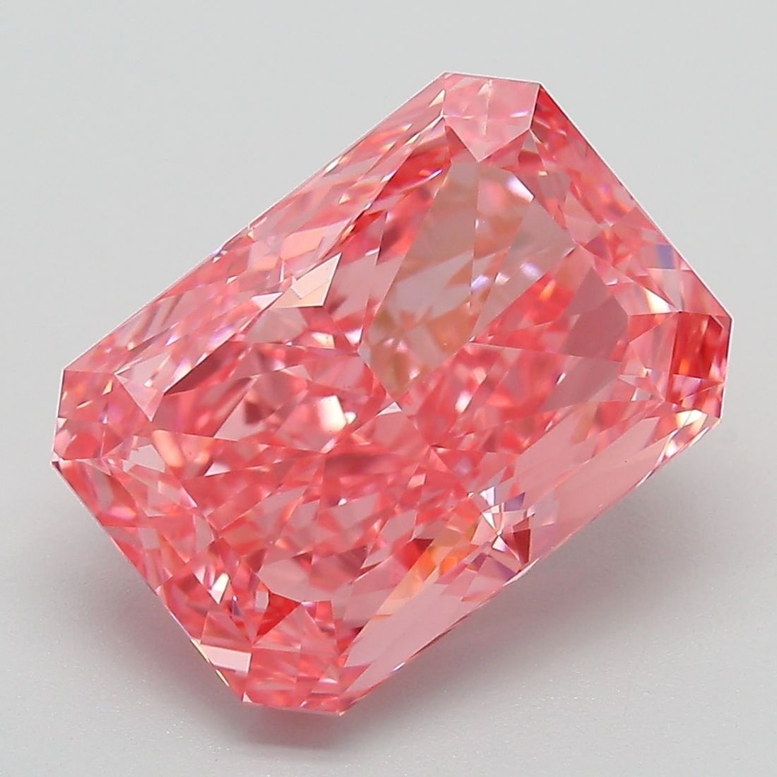 Loose Diamond - RADIANT 6.52ct Fancy Vivid Pink VS1: Loose Diamond - RADIANT 6.52ct Fancy Vivid Pink VS1 Source: This is a real non-mined Diamond that has been grown in a lab Shape: RADIANT Carats: 6.52 Color: Fancy Vivid Pink Certification: IGI Video: