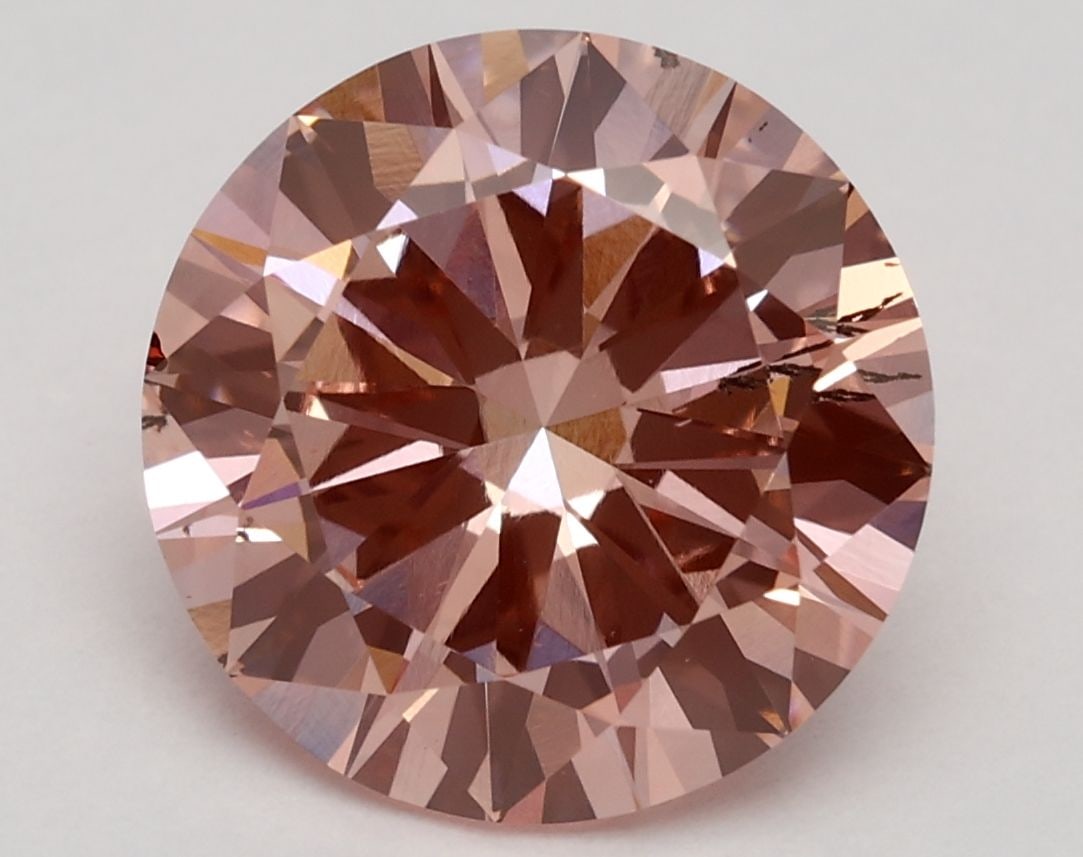 Loose Diamond - ROUND 3.01ct Fancy Vivid Pink SI1: Loose Diamond - ROUND 3.01ct Fancy Vivid Pink SI1 Source: This is a real non-mined Diamond that has been grown in a lab Shape: ROUND Carats: 3.01 Color: Fancy Vivid Pink Certification: IGI Video: