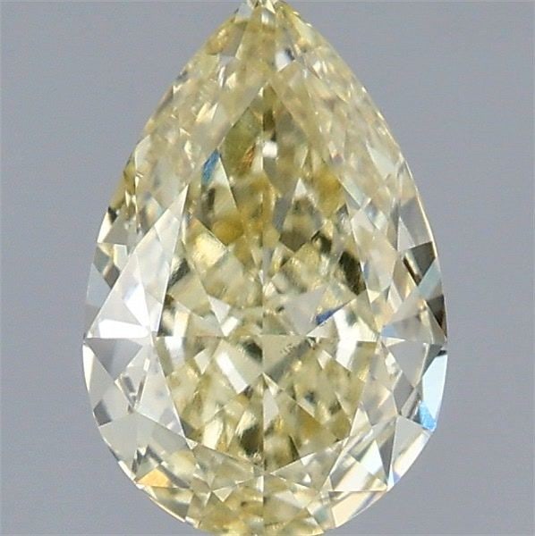 Loose Diamond - PEAR 1.56ct Fancy Yellow VS1: Loose Diamond - PEAR 1.56ct Fancy Yellow VS1 Source: This is a real non-mined Diamond that has been grown in a lab Shape: PEAR Carats: 1.56 Color: Fancy Yellow Certification: IGI Video: