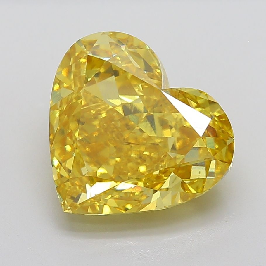 Loose Diamond - HEART 12.12ct Fancy Vivid Yellow VS2: Loose Diamond - HEART 12.12ct Fancy Vivid Yellow VS2 Source: This is a real non-mined Diamond that has been grown in a lab Shape: HEART Carats: 12.12 Color: Fancy Vivid Yellow Certification: IGI Video