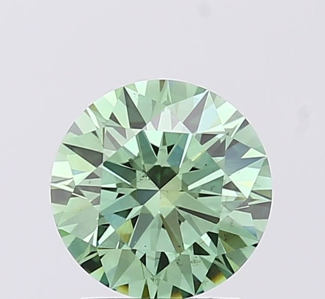 Ideal Loose Diamond - ROUND 1.51ct Fancy Vivid Green VS2: Ideal Loose Diamond - ROUND 1.51ct Fancy Vivid Green VS2 Source: This is a real non-mined Diamond that has been grown in a lab Shape: ROUND Carats: 1.51 Color: Fancy Vivid Green Certification: IGI Vid