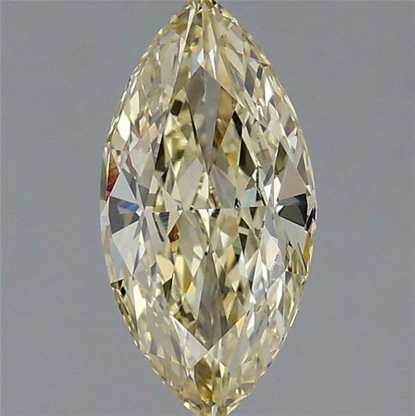 Loose Diamond - MARQUISE 1.56ct Fancy Yellow VVS2: Loose Diamond - MARQUISE 1.56ct Fancy Yellow VVS2 Source: This is a real non-mined Diamond that has been grown in a lab Shape: MARQUISE Carats: 1.56 Color: Fancy Yellow Certification: IGI Video: