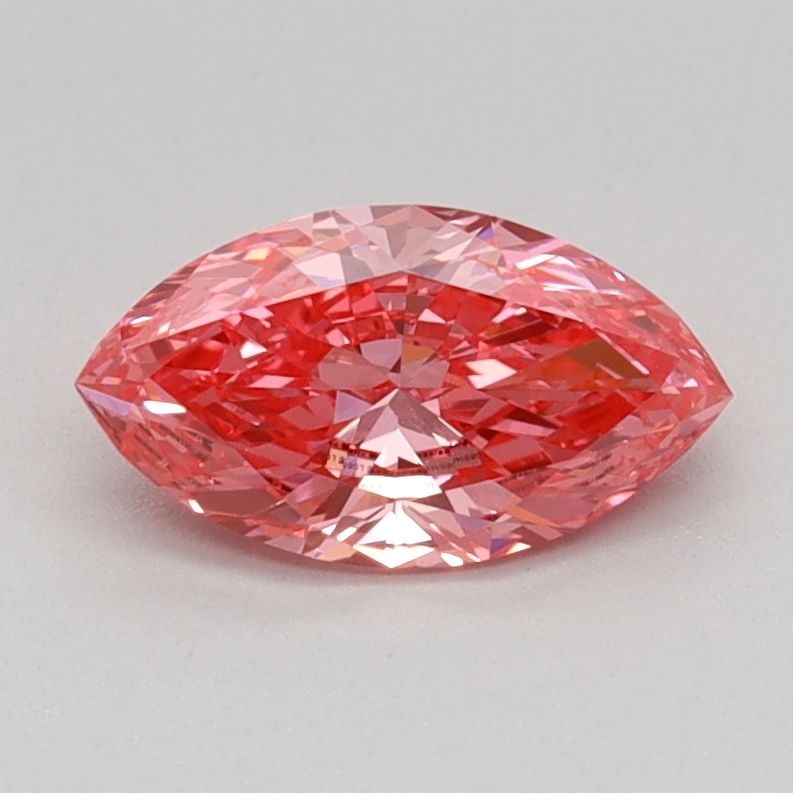 Loose Diamond - MARQUISE 0.61ct Fancy Vivid Pink VVS2: Loose Diamond - MARQUISE 0.61ct Fancy Vivid Pink VVS2 Source: This is a real non-mined Diamond that has been grown in a lab Shape: MARQUISE Carats: 0.61 Color: Fancy Vivid Pink Certification: IGI