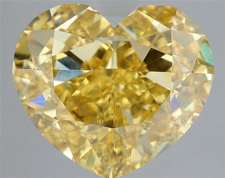 Loose Diamond - HEART 7.1ct Fancy Vivid Yellow VS1: Loose Diamond - HEART 7.1ct Fancy Vivid Yellow VS1 Source: This is a real non-mined Diamond that has been grown in a lab Shape: HEART Carats: 7.1 Color: Fancy Vivid Yellow Certification: IGI Video: