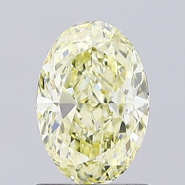 Loose Diamond - OVAL 1.08ct Fancy Light Yellow VS1: Loose Diamond - OVAL 1.08ct Fancy Light Yellow VS1 Source: This is a real non-mined Diamond that has been grown in a lab Shape: OVAL Carats: 1.08 Color: Fancy Light Yellow Certification: IGI Video: