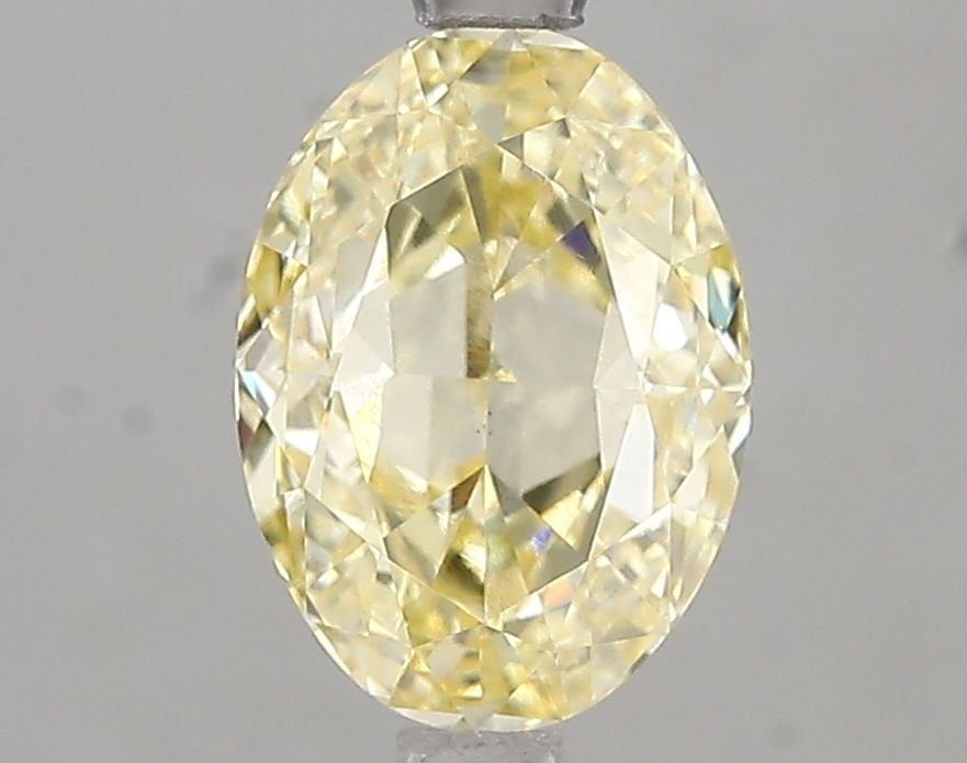 Loose Diamond - OVAL 2.06ct Fancy Yellow VS1: Loose Diamond - OVAL 2.06ct Fancy Yellow VS1 Source: This is a real non-mined Diamond that has been grown in a lab Shape: OVAL Carats: 2.06 Color: Fancy Yellow Certification: IGI Video: