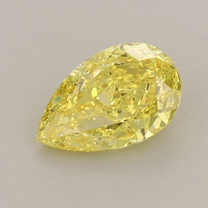 Loose Diamond - PEAR 0.74ct Fancy Vivid Yellow VVS2: Loose Diamond - PEAR 0.74ct Fancy Vivid Yellow VVS2 Source: This is a real non-mined Diamond that has been grown in a lab Shape: PEAR Carats: 0.74 Color: Fancy Vivid Yellow Certification: IGI Video: