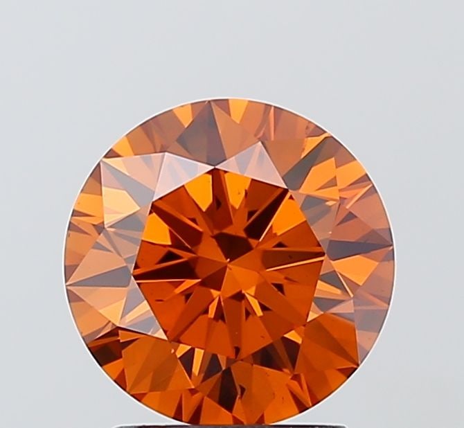 Ideal Loose Diamond - ROUND 2.05ct Fancy Deep Orange VS2: Ideal Loose Diamond - ROUND 2.05ct Fancy Deep Orange VS2 Source: This is a real non-mined Diamond that has been grown in a lab Shape: ROUND Carats: 2.05 Color: Fancy Deep Orange Certification: IGI Vid