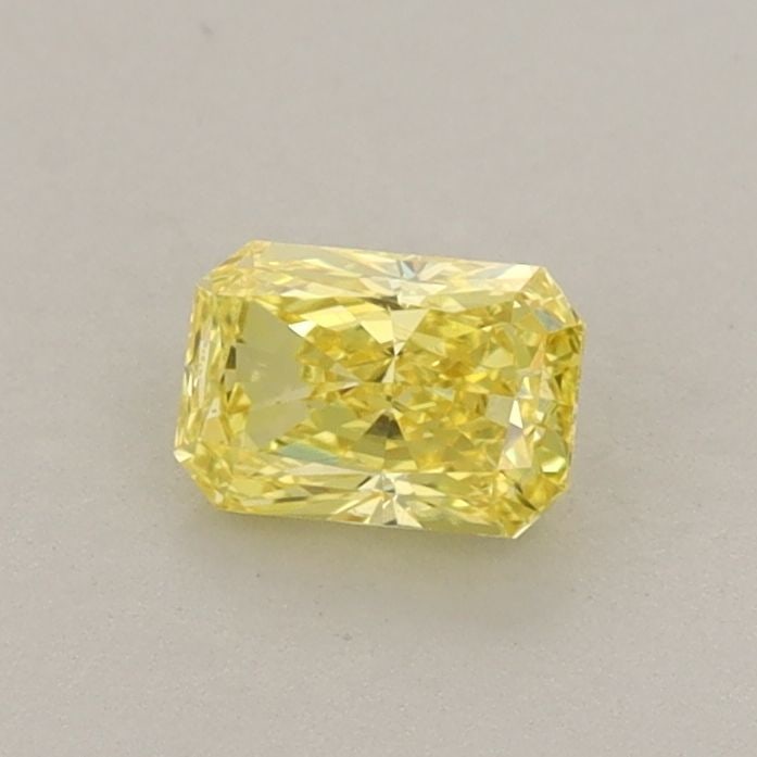 Loose Diamond - RADIANT 0.41ct Fancy Vivid Yellow VS2: Loose Diamond - RADIANT 0.41ct Fancy Vivid Yellow VS2 Source: This is a real non-mined Diamond that has been grown in a lab Shape: RADIANT Carats: 0.41 Color: Fancy Vivid Yellow Certification: IGI