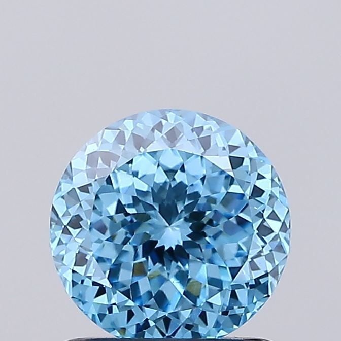 Loose Diamond - ROUND 0.89ct Fancy Vivid Blue VS1: Loose Diamond - ROUND 0.89ct Fancy Vivid Blue VS1 Source: This is a real non-mined Diamond that has been grown in a lab Shape: ROUND Carats: 0.89 Color: Fancy Vivid Blue Certification: IGI Video: