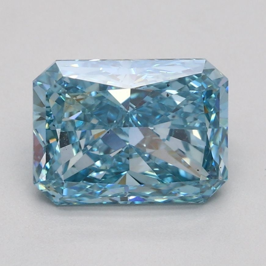Loose Diamond - RADIANT 1.55ct Fancy Vivid Blue VS2: Loose Diamond - RADIANT 1.55ct Fancy Vivid Blue VS2 Source: This is a real non-mined Diamond that has been grown in a lab Shape: RADIANT Carats: 1.55 Color: Fancy Vivid Blue Certification: IGI Video: