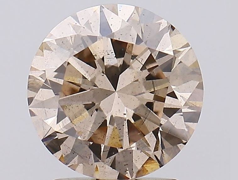 Loose Diamond - ROUND 2.05ct Fancy Light Brown SI1: Loose Diamond - ROUND 2.05ct Fancy Light Brown SI1 Source: This is a real non-mined Diamond that has been grown in a lab Shape: ROUND Carats: 2.05 Color: Fancy Light Brown Certification: IGI Video: