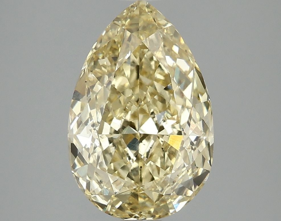 Loose Diamond - PEAR 3.03ct Fancy Vivid Yellow VS2: Loose Diamond - PEAR 3.03ct Fancy Vivid Yellow VS2 Source: This is a real non-mined Diamond that has been grown in a lab Shape: PEAR Carats: 3.03 Color: Fancy Vivid Yellow Certification: IGI Video: