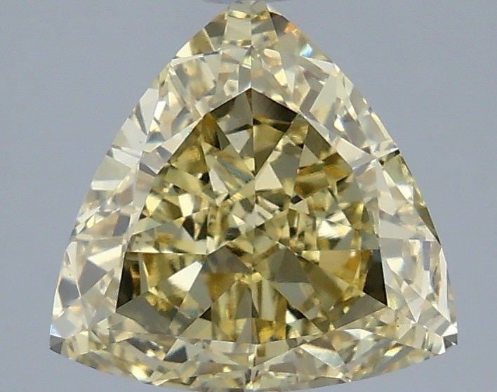 Loose Diamond - TRIANGULAR 3.08ct Fancy Yellow VS1: Loose Diamond - TRIANGULAR 3.08ct Fancy Yellow VS1 Source: This is a real non-mined Diamond that has been grown in a lab Shape: TRIANGULAR Carats: 3.08 Color: Fancy Yellow Certification: IGI Video: