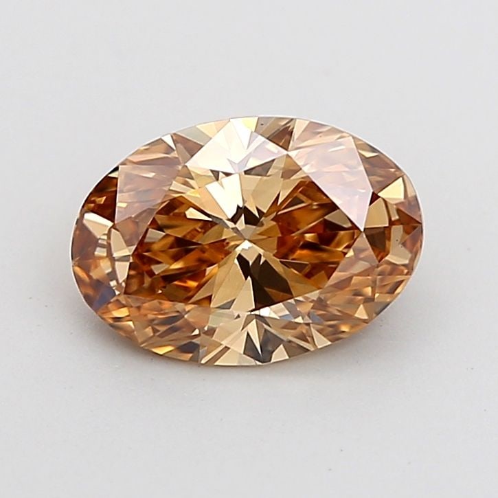 Loose Diamond - OVAL 1.4ct Fancy Orangey Brown VVS2: Loose Diamond - OVAL 1.4ct Fancy Orangey Brown VVS2 Source: This is a real non-mined Diamond that has been grown in a lab Shape: OVAL Carats: 1.4 Color: Fancy Orangey Brown Certification: IGI Video: