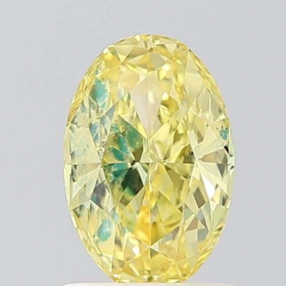 Loose Diamond - OVAL 1.02ct Fancy Vivid Yellow VS1: Loose Diamond - OVAL 1.02ct Fancy Vivid Yellow VS1 Source: This is a real non-mined Diamond that has been grown in a lab Shape: OVAL Carats: 1.02 Color: Fancy Vivid Yellow Certification: IGI Video: