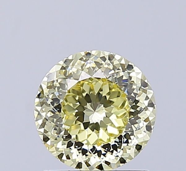 Loose Diamond - ROUND 1.31ct Fancy Light Yellow VVS2: Loose Diamond - ROUND 1.31ct Fancy Light Yellow VVS2 Source: This is a real non-mined Diamond that has been grown in a lab Shape: ROUND Carats: 1.31 Color: Fancy Light Yellow Certification: IGI Video: