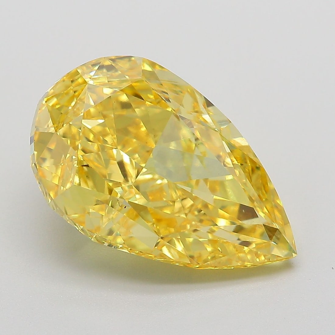 Loose Diamond - PEAR 7.54ct Fancy Vivid Yellow VVS2: Loose Diamond - PEAR 7.54ct Fancy Vivid Yellow VVS2 Source: This is a real non-mined Diamond that has been grown in a lab Shape: PEAR Carats: 7.54 Color: Fancy Vivid Yellow Certification: IGI Video: