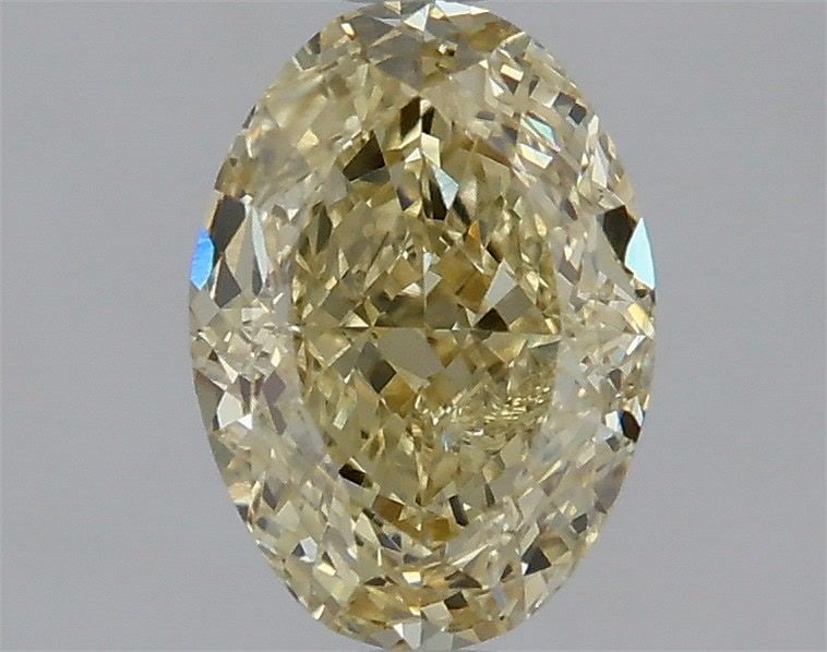 Loose Diamond - OVAL 1.01ct Fancy Yellow VS1: Loose Diamond - OVAL 1.01ct Fancy Yellow VS1 Source: This is a real non-mined Diamond that has been grown in a lab Shape: OVAL Carats: 1.01 Color: Fancy Yellow Certification: IGI Video: