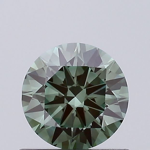 Loose Diamond - ROUND 0.67ct Fancy Vivid Green VS1: Loose Diamond - ROUND 0.67ct Fancy Vivid Green VS1 Source: This is a real non-mined Diamond that has been grown in a lab Shape: ROUND Carats: 0.67 Color: Fancy Vivid Green Certification: IGI Video: