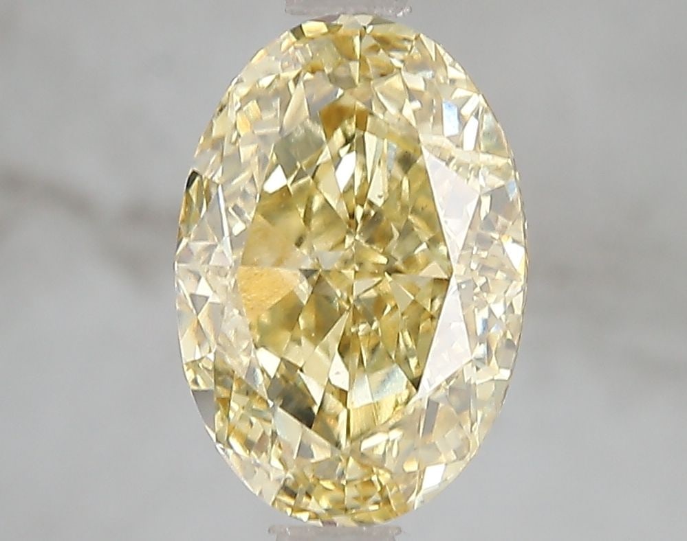 Loose Diamond - OVAL 3.01ct Fancy Intense Yellow VS2: Loose Diamond - OVAL 3.01ct Fancy Intense Yellow VS2 Source: This is a real non-mined Diamond that has been grown in a lab Shape: OVAL Carats: 3.01 Color: Fancy Intense Yellow Certification: IGI Video