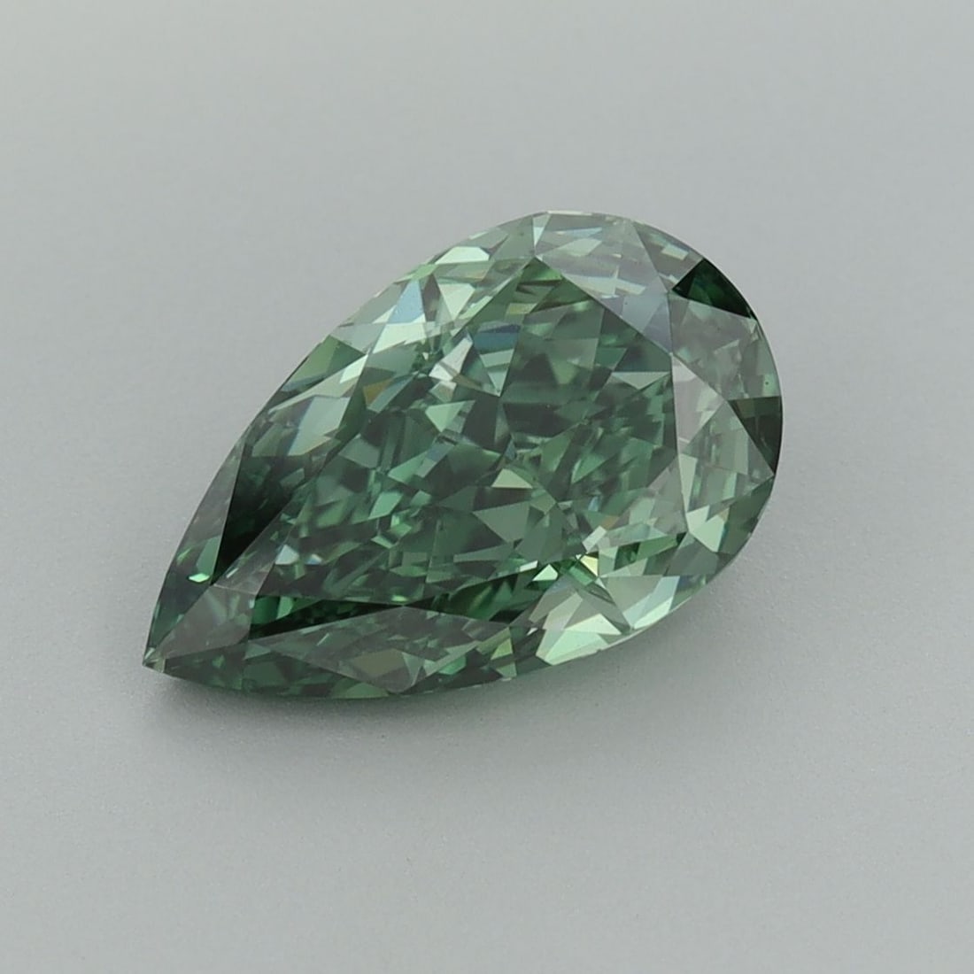 Loose Diamond - PEAR 2.08ct Fancy Vivid Green VVS1: Loose Diamond - PEAR 2.08ct Fancy Vivid Green VVS1 Source: This is a real non-mined Diamond that has been grown in a lab Shape: PEAR Carats: 2.08 Color: Fancy Vivid Green Certification: IGI Video: