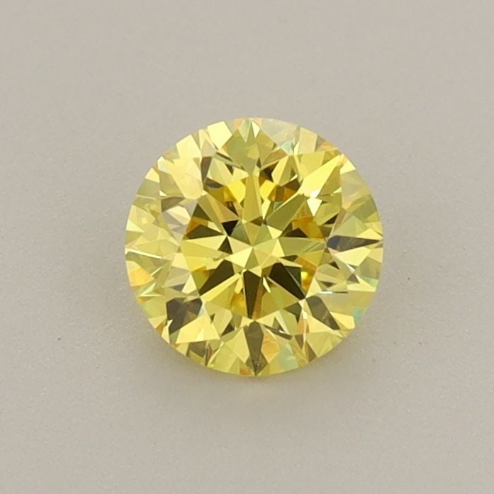 Loose Diamond - ROUND 0.58ct Fancy Vivid Yellow VVS2: Loose Diamond - ROUND 0.58ct Fancy Vivid Yellow VVS2 Source: This is a real non-mined Diamond that has been grown in a lab Shape: ROUND Carats: 0.58 Color: Fancy Vivid Yellow Certification: IGI Video:
