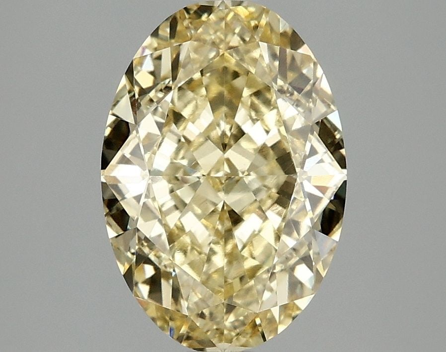 Loose Diamond - OVAL 3.08ct Fancy Vivid Yellow VS1: Loose Diamond - OVAL 3.08ct Fancy Vivid Yellow VS1 Source: This is a real non-mined Diamond that has been grown in a lab Shape: OVAL Carats: 3.08 Color: Fancy Vivid Yellow Certification: IGI Video: