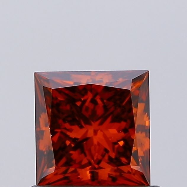 Loose Diamond - PRINCESS 0.68ct Fancy Vivid Orange VS2: Loose Diamond - PRINCESS 0.68ct Fancy Vivid Orange VS2 Source: This is a real non-mined Diamond that has been grown in a lab Shape: PRINCESS Carats: 0.68 Color: Fancy Vivid Orange Certification: IGI V